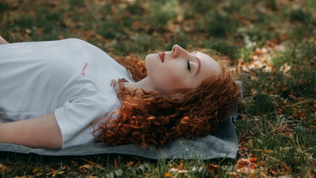 Woman laying down creating her sanctuary using visualization