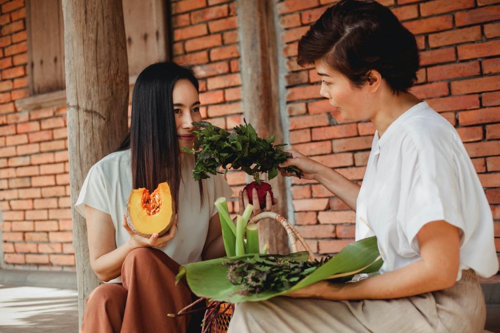 Woman eating fruits and herbs for improved health