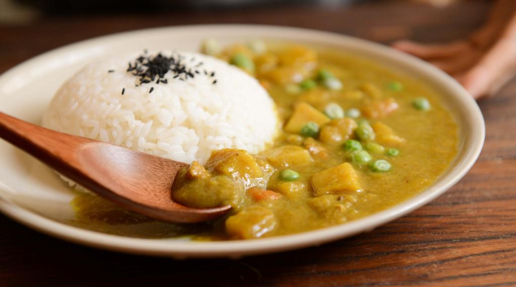 Yogic cooking - curry food with rice