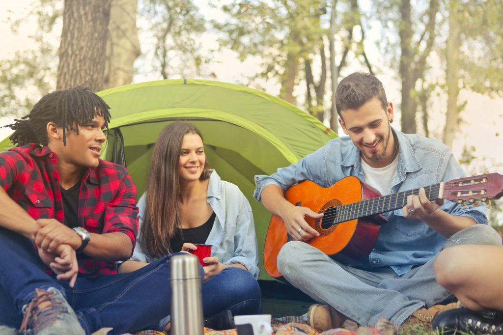 Friends listening to guitar