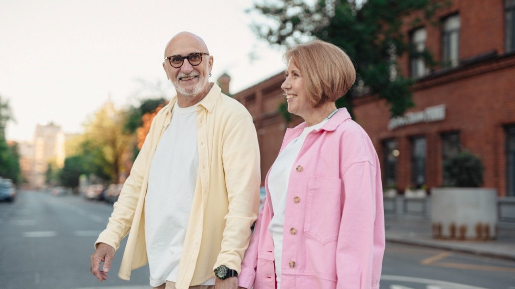 Elderly couple walking to prevent strokes