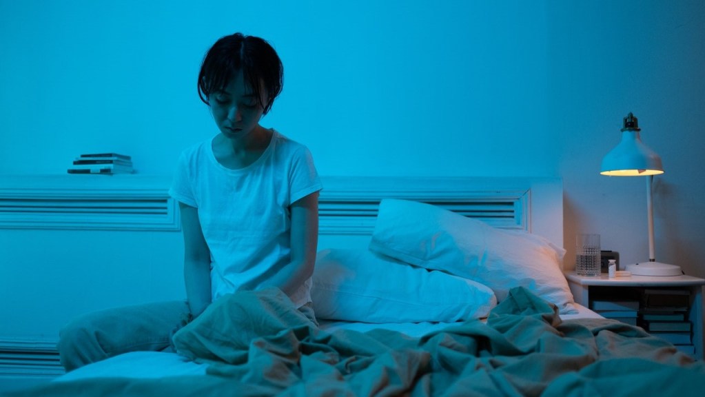 Woman in bed with insomnia