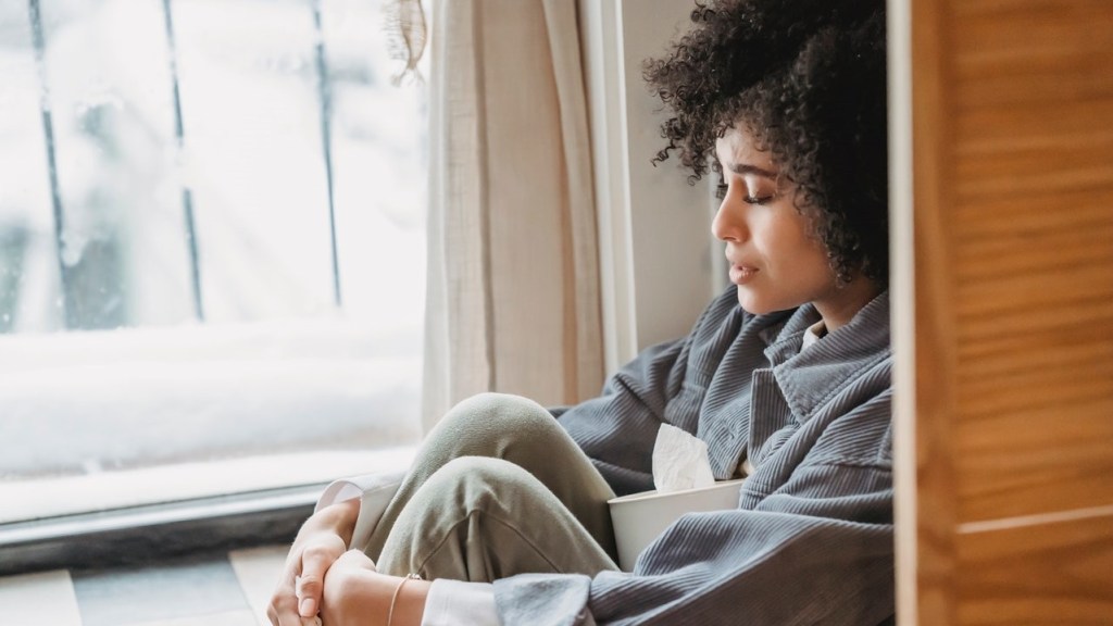 Woman sitting and using guided imagery for healing