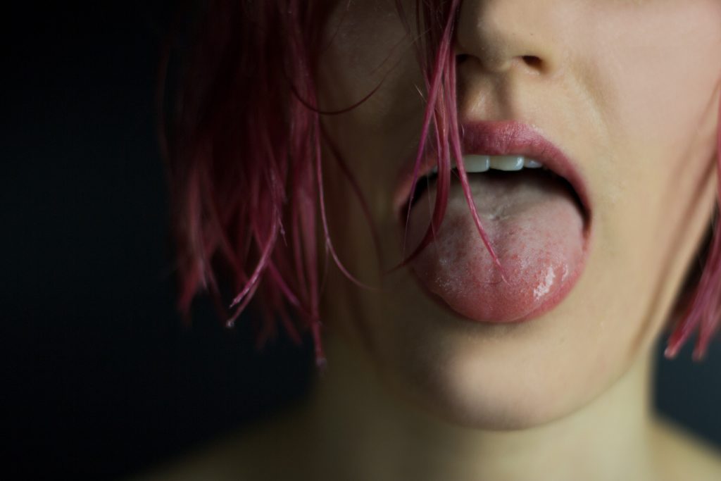 Woman sticking her tongue out