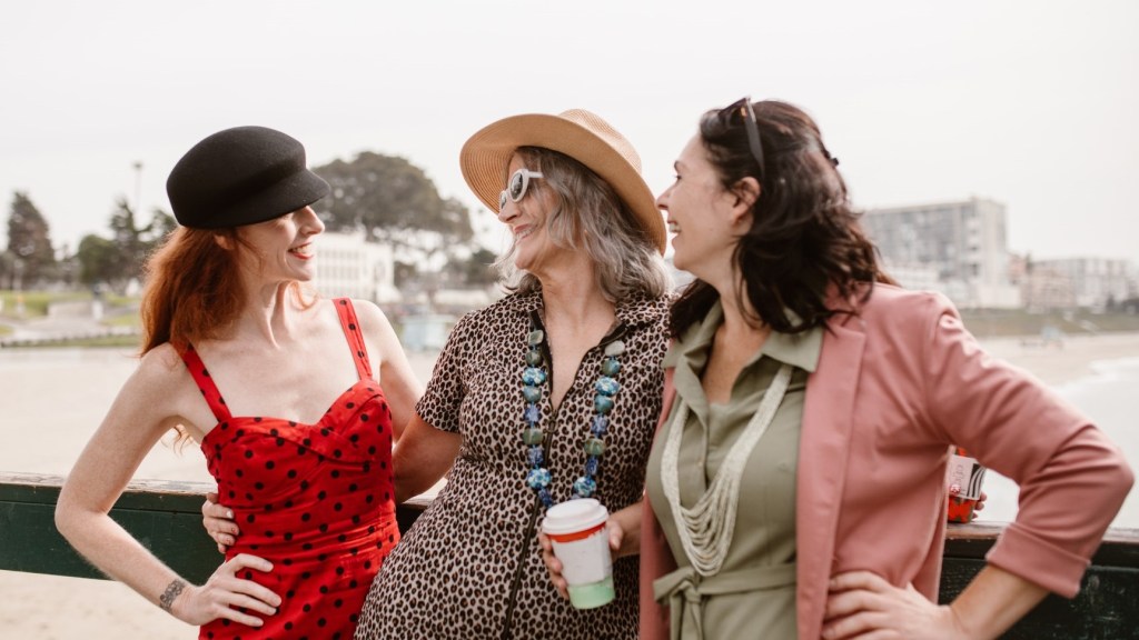 Healthy women with PMS or Menopause, standing by the ocean