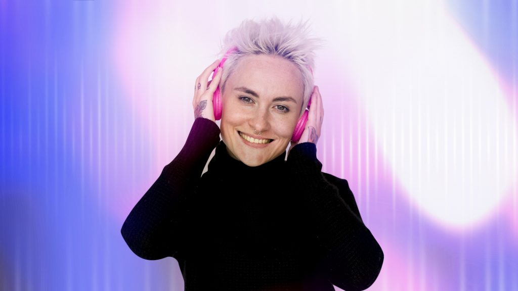 Woman listening to music thinking positive thoughts