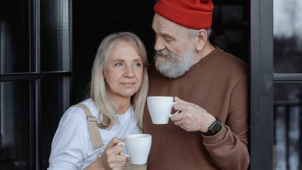 Menopausal woman and man drinking coffee